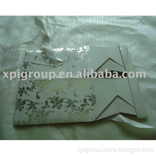 die cut card box with UV coating, silver foil hot stamping and ribbon decoration